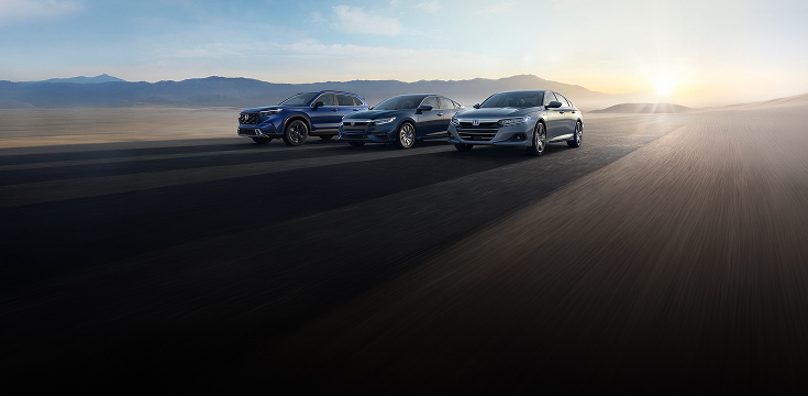 2022 Honda CR-V, Insight and Accord front profile driving on a desert highway at sunset. 2022 Honda CR-V, Insight and Accord front profile driving on a desert highway at sunset.